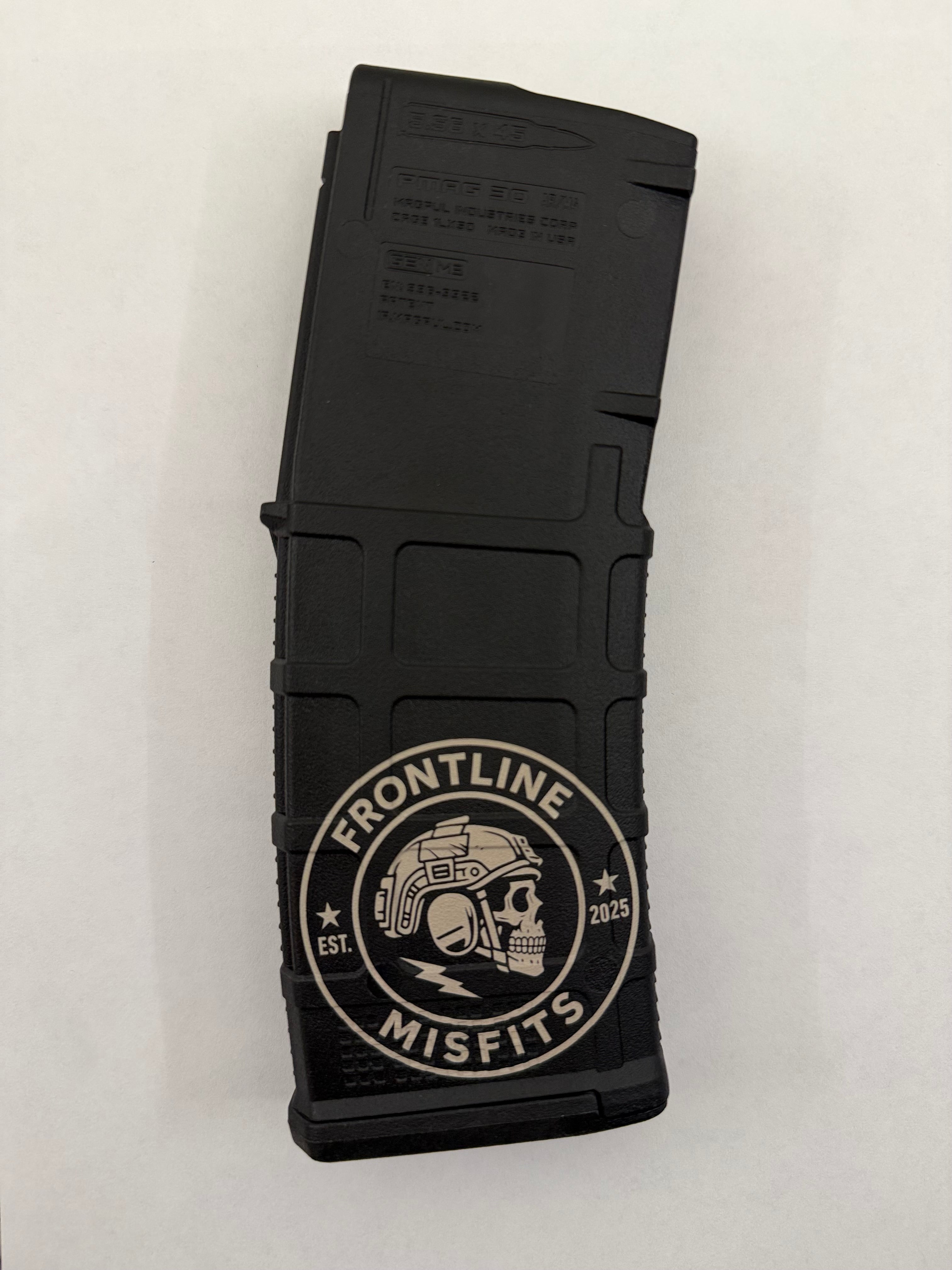 Black PMAG with 'Frontline Misfits' logo on a white background