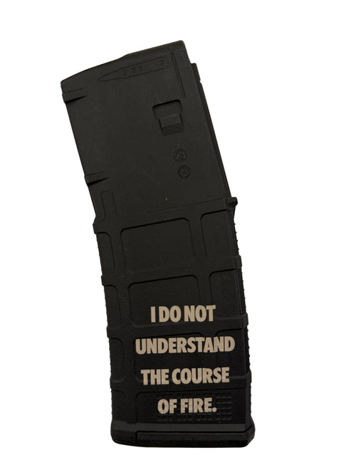 Black PMAG with "I DO NOT UNDERSTAND THE COURSE OF FIRE" on a white background. 
