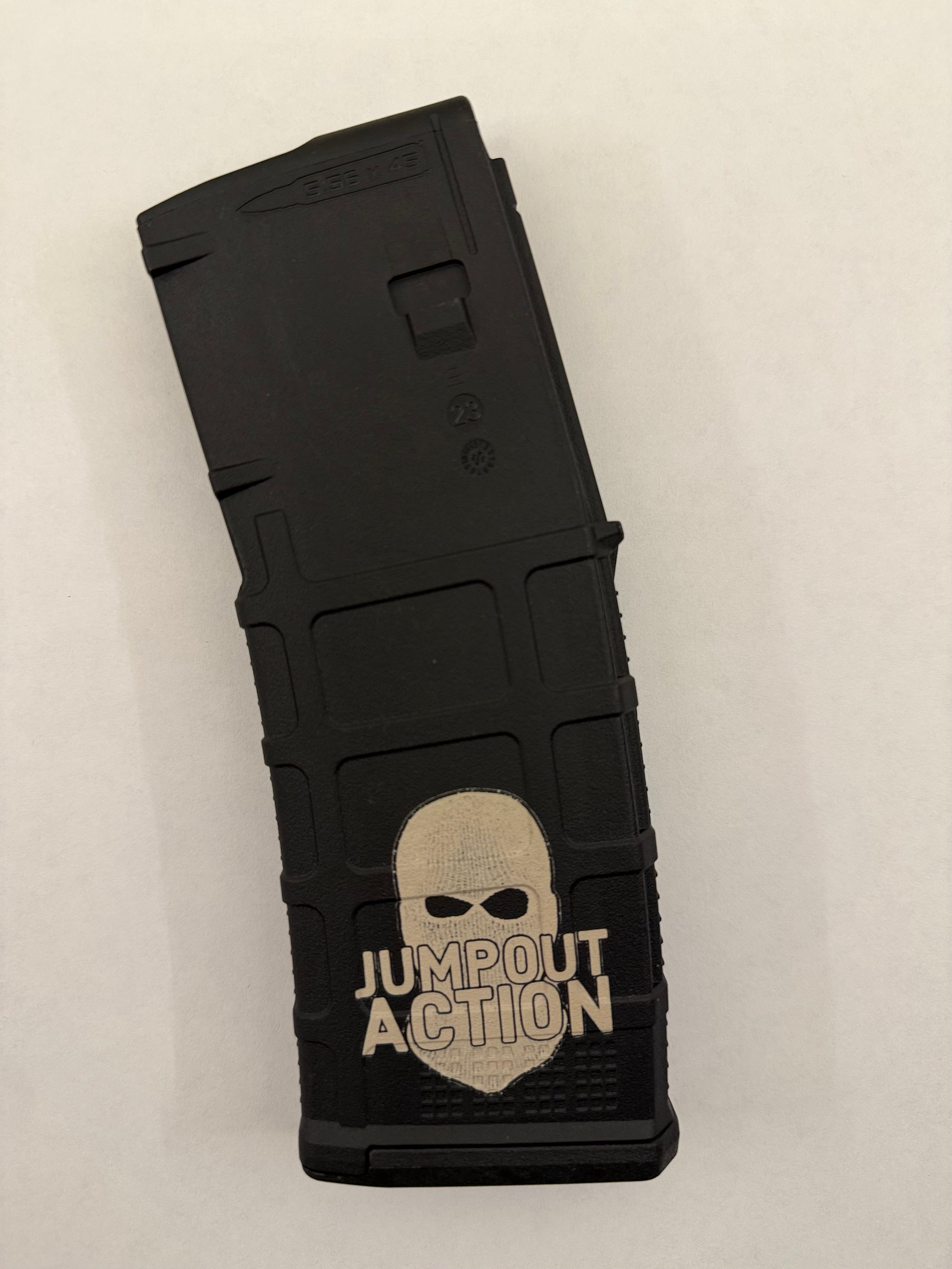 Black PMAG with 'Jumpout Action' logo on a white background.